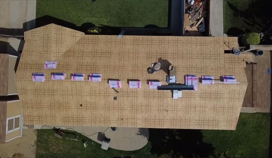 New deck and materials staged during roof replacement